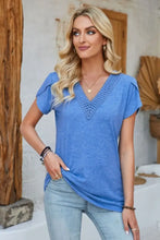 Womens blue V-neck short-sleeve top with petal sleeve crochet trim