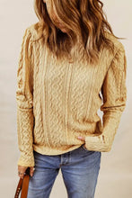 Light yellow cable-knit round neck long sleeve blouse with puffed sleeves