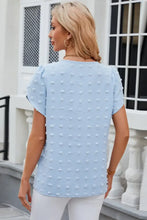 Light blue Swiss dot round neck short sleeve T-shirt with pom-pom details