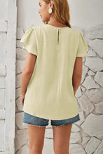 Round neck keyhole cap sleeve T-shirt in light yellow with denim shorts