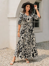 Black and White Floral Maxi Dress with Tie and Ruched Details Maxi Dresses