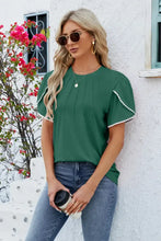 Round neck petal sleeve T-shirt in dark green with pintuck and pom-pom trim