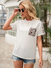 Ivy Lane Pocketed Leopard Round Neck Short Sleeve T-Shirt Woman T Shirts
