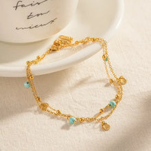 Gold-Tone Double-Strand Bracelet with Turquoise Beads and Seashell Charms Fashion Jewelry