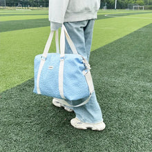Light Blue Textured Duffel and Tote Travel Bag with White Straps Travel Bags