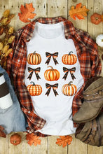 White pumpkin bow print t-shirt for women with layered orange plaid shirt