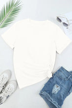 White pumpkin and bow print t-shirt with denim shorts and sneakers