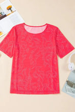 Red patterned short sleeve shirt featured in Women’s Pink and Red Patterned Short Sleeve Top