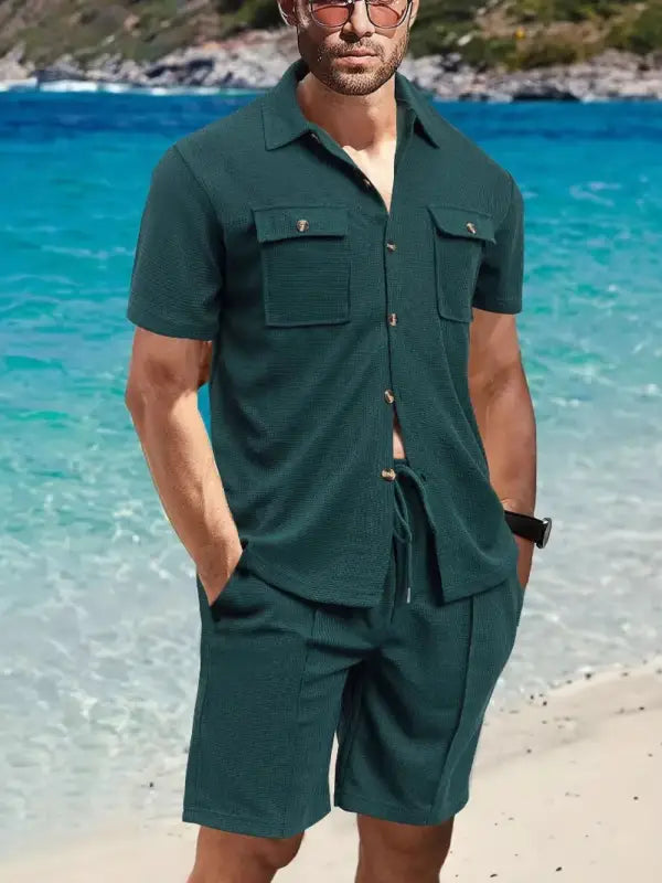 Dark green textured polyester short set shirt with pockets and drawstring.
