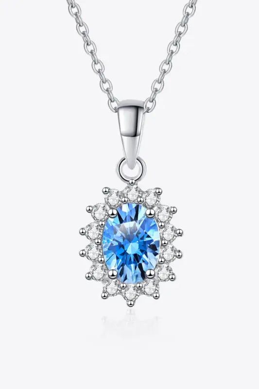 Elegant 1 carat moissanite necklace with oval blue gem halo design