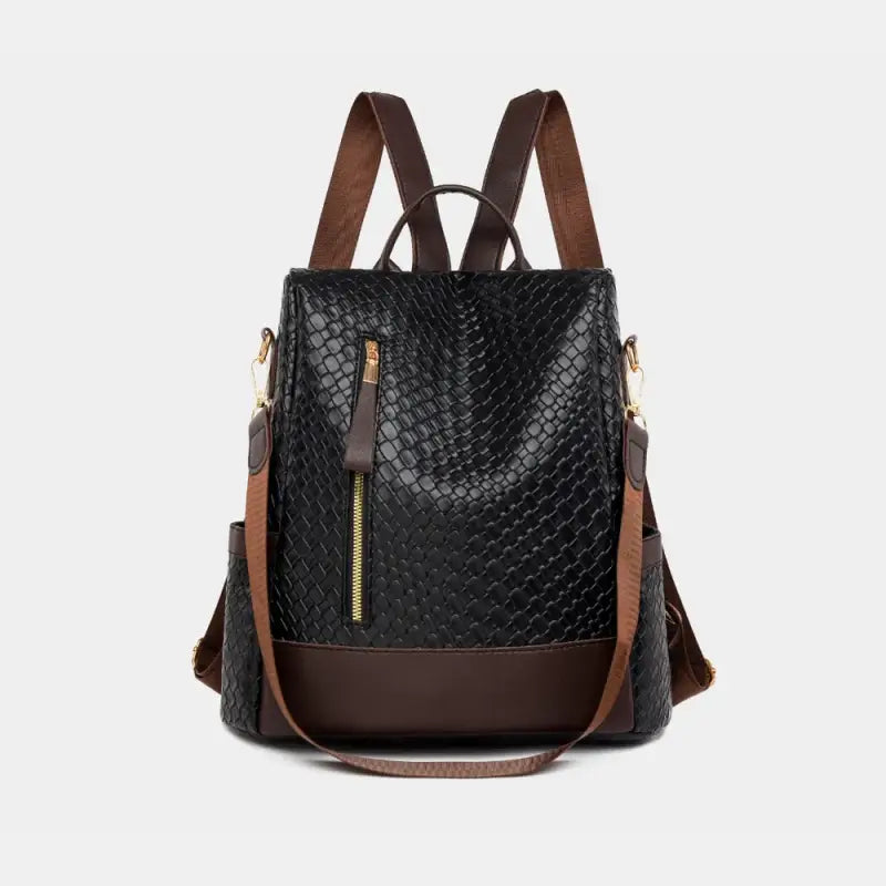Elegant black leather backpack with textured finish, brown straps, gold zippers