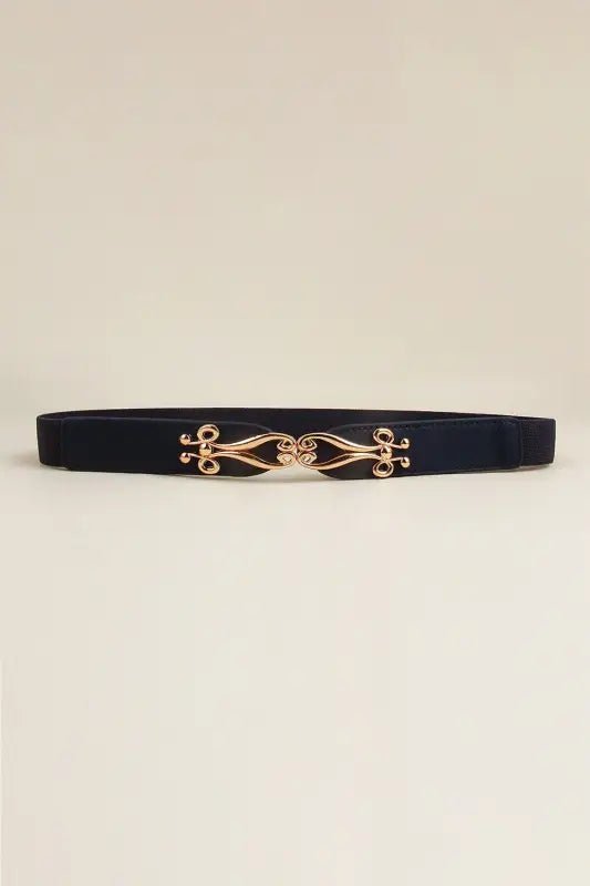 Hipomarket’s ornate gold-toned alloy buckle on navy elastic belt