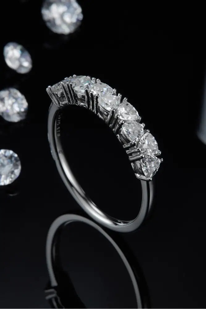 1 carat moissanite sterling silver ring with platinum band and five diamonds