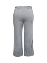 Gray heathered cropped pants with elastic waistband complement plus size striped contrast wide leg pants collection