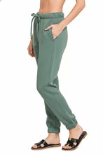 Zenana moss green fleece drawstring joggers with elastic waistband, ribbed cuffs, and pockets for comfortable wear