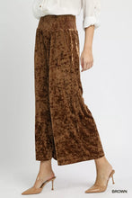 Brown velvet smocked waistband wide-leg pants with high-waisted elastic waistband and subtle texture by umgee