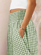 Green and white gingham check high-waisted wide leg pants with elastic waistband for stylish casual wear