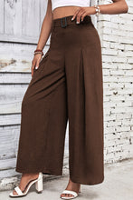 High waisted wide leg brown pleated trousers with black belt buckle for stylish wide leg pants look