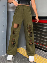 Olive green distressed elastic waist straight leg cargo pants with ripped details on thighs and knees