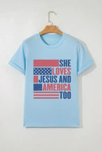 Light blue round neck short sleeve t-shirt with distressed flag graphic