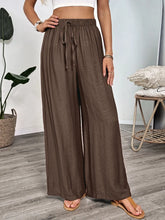 Brown casual wide-leg pants with elastic waist and drawstring suitable for care instructions and everyday wear