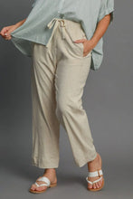 Beige linen blend trousers with drawstring elastic waistband and side pockets from Umgee plus size machine wash cold