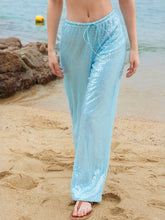 Light blue sequin wide leg pants with a drawstring waist designed as stylish wide leg beachwear
