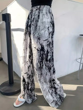 Black and white marble-patterned abstract print wide leg pants in soft fabric perfect for casual wear