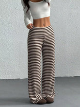Brown and white striped wide leg pants with ribbed texture featuring a comfortable wide leg fit