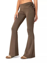 Brown high-waisted flare pants in polyester fabric with a drawstring tie at the waist for comfortable fit