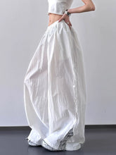 White elastic waist wide-leg pants with a relaxed fit and subtle texture ideal for casual wear