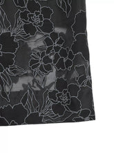 Black sheer fabric with delicate white floral embroidery on lace hem wide leg pants for elegant styling