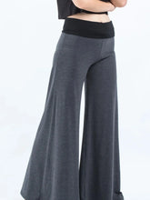Dark gray high waisted wide leg yoga pants with contrast waistband in soft stretchy fabric and elastic waistband