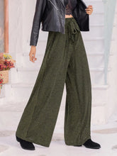 Olive green ribbed wide-leg trousers with high waist tie and drawstring waist for a striped high waist look