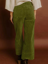 Olive green corduroy solid color high waist wide leg pants with ruffled hem for stylish casual wear
