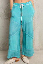 Turquoise corduroy pol elastic waistband wide leg pants with drawstring and contrasting textured panels