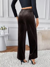 Dark brown pleated velvet high-waisted wide-leg pants with elastic waistband for comfortable wear