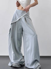 Light blue wide leg pants with delicate white lace trim along the side seam perfect for elegant wear