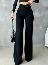 Black high waist wide leg pants with single button closure designed for a perfect fit and easy machine wash care instructions