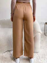 Tan wide leg drawstring casual pants with elastic waistband designed for comfortable everyday wear