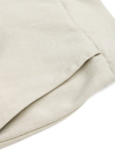 Beige linen slit wide leg pleated pants with subtle woven texture and clean precise stitching for elegant wear