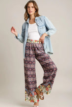 Umgee full size mixed print elastic waistband pants in muted purple and pink with floral pattern and embroidered hem detailing