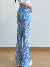 Blue floral print flare leg pants with high waist and elasticated band in lightweight fabric for casual wear