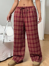 Red and beige plaid wide leg pants with elastic waistband and drawstring for comfortable casual wear