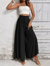 Black frill wide leg pants with elastic waistband and drawstring detail in high-waisted wide leg style