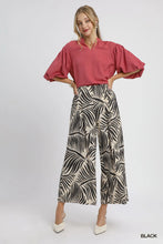 Umgee black and cream palm leaf print culotte pants with wide-leg design for stylish casual wear