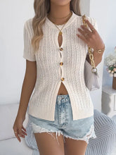 Cream cable knit button short sleeve cardigan with gold buttons and lace detailing