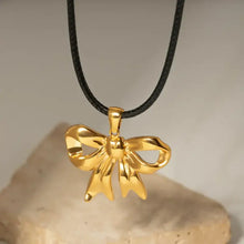 Shiny 18K gold-plated bow pendant necklace on black cord