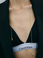 Calvin Klein white and gray underwear with 18k gold-plated chain pendant