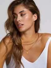 18k gold-plated cross necklace with layered chains and adjustable extension chain length